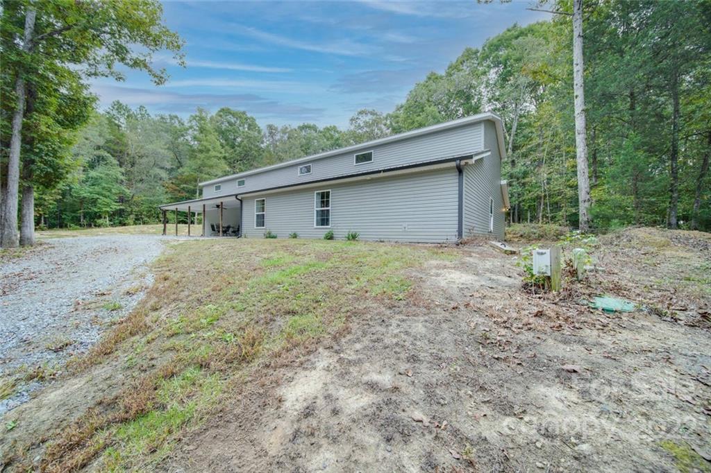 3579 Harmony Road Catawba, SC 29704 - Photo 45 of 48 a view of a house with a yard and large tree