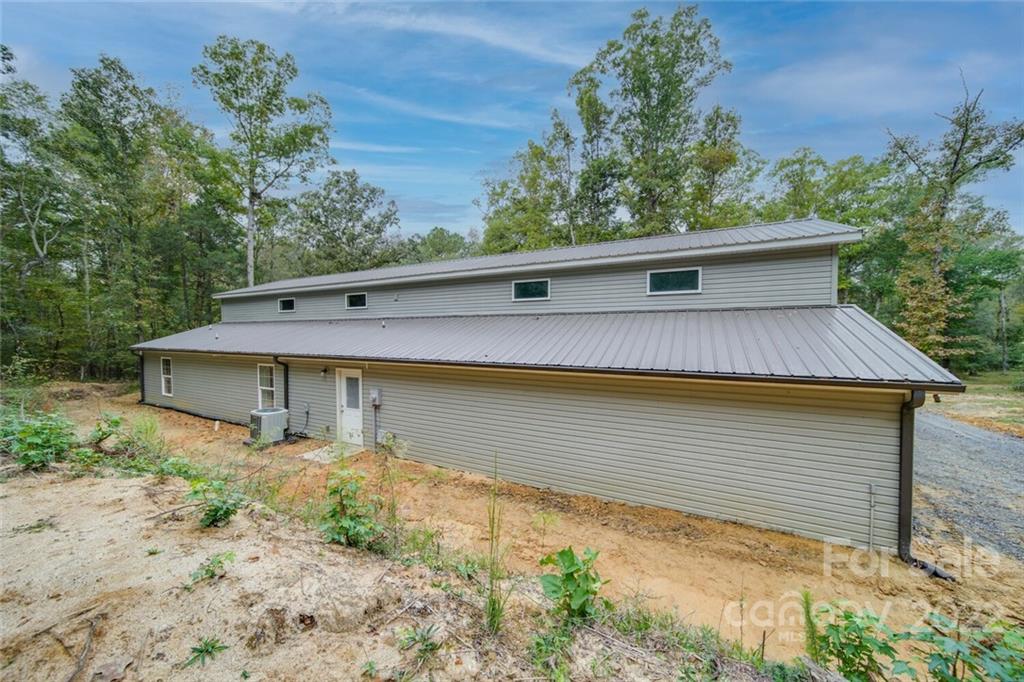 3579 Harmony Road Catawba, SC 29704 - Photo 46 of 48 a view of a house with a yard