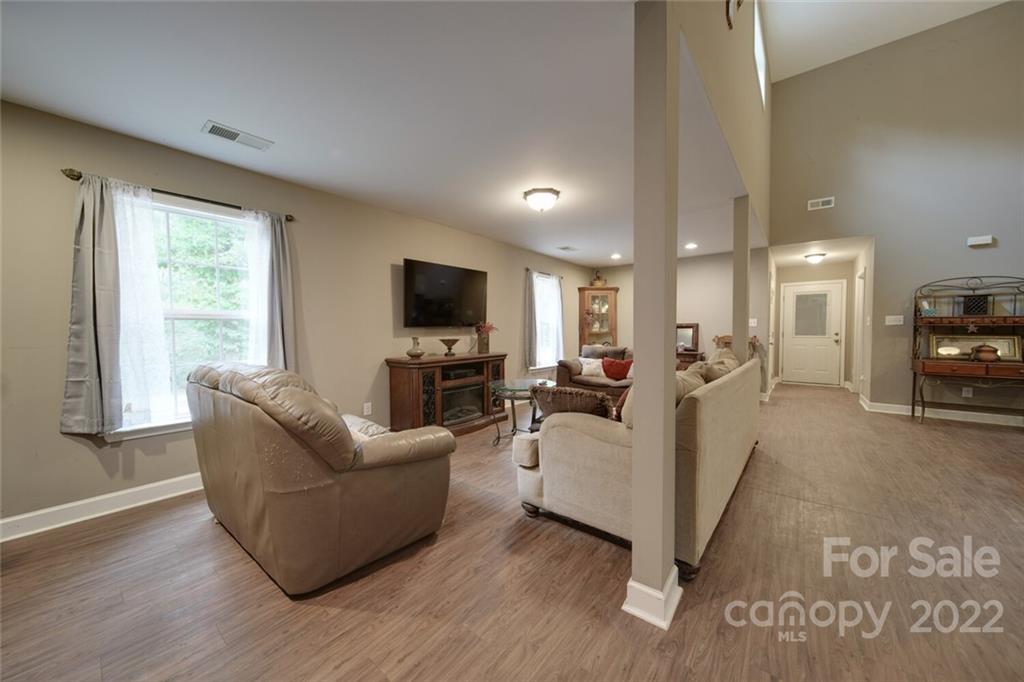 3579 Harmony Road Catawba, SC 29704 - Photo 7 of 48 a living room with furniture and a flat screen tv