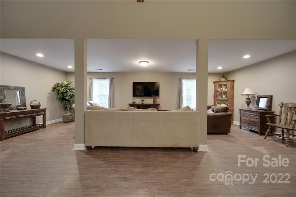 3579 Harmony Road Catawba, SC 29704 - Photo 8 of 48 a living room with furniture and a flat screen tv