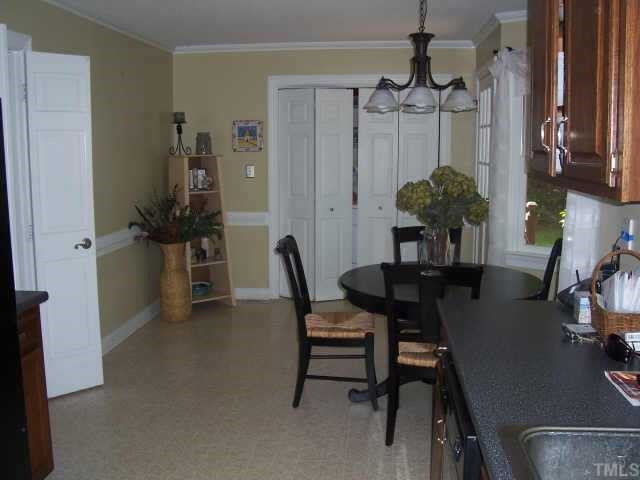 4509 Tetbury Place Raleigh, NC 27613 - Photo 6 of 12 Spacious Kitchen has Pantry and Closeted Washer/Dryer Area. Other
