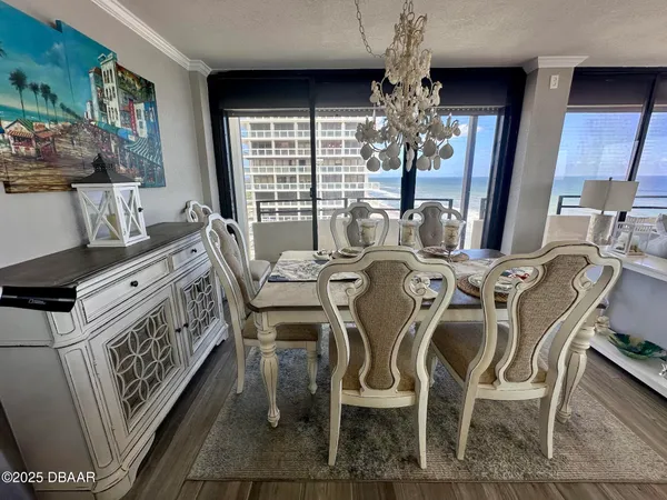 a view of dining table and chairs in living room