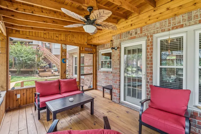 a blue bench sitting in front of a building