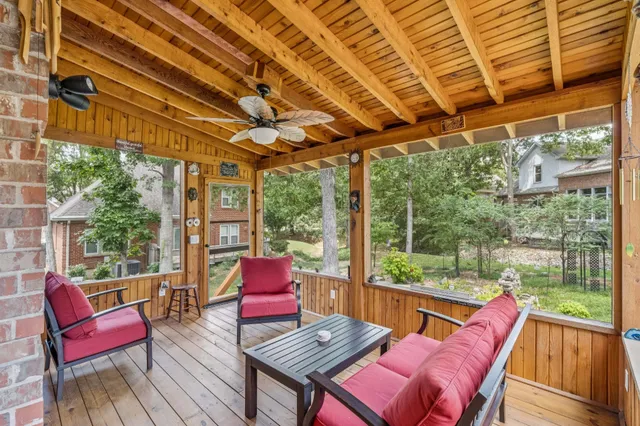 a view of porch with a seating space