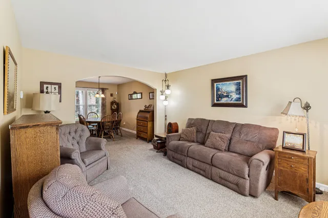 a living room with furniture and a couch