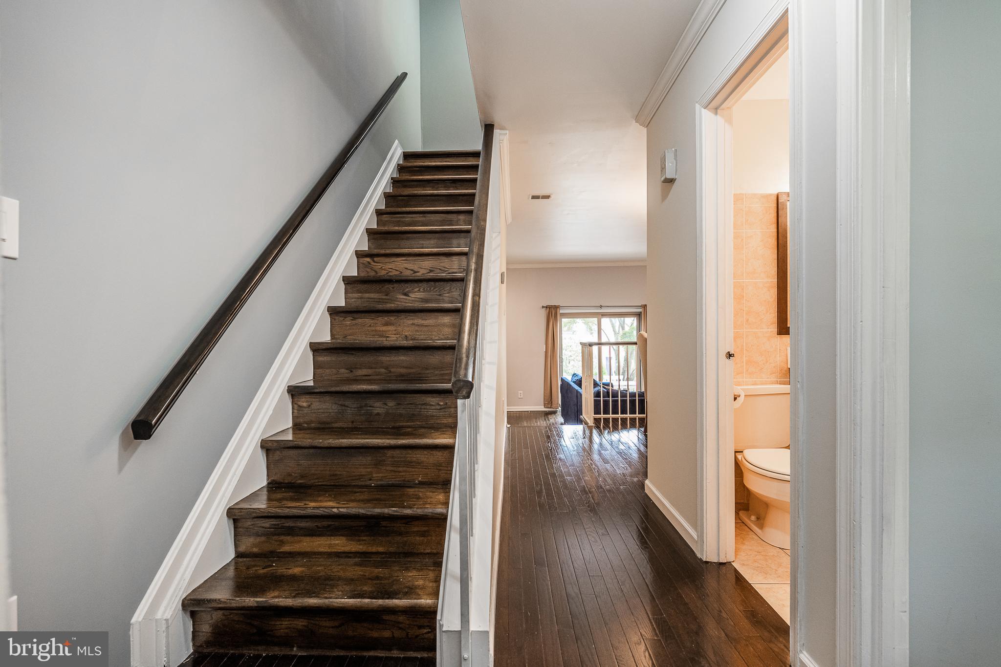 2148 Golf Course Drive Reston, VA 20191 - Photo 11 of 31 Hardwood Staircase to upper level