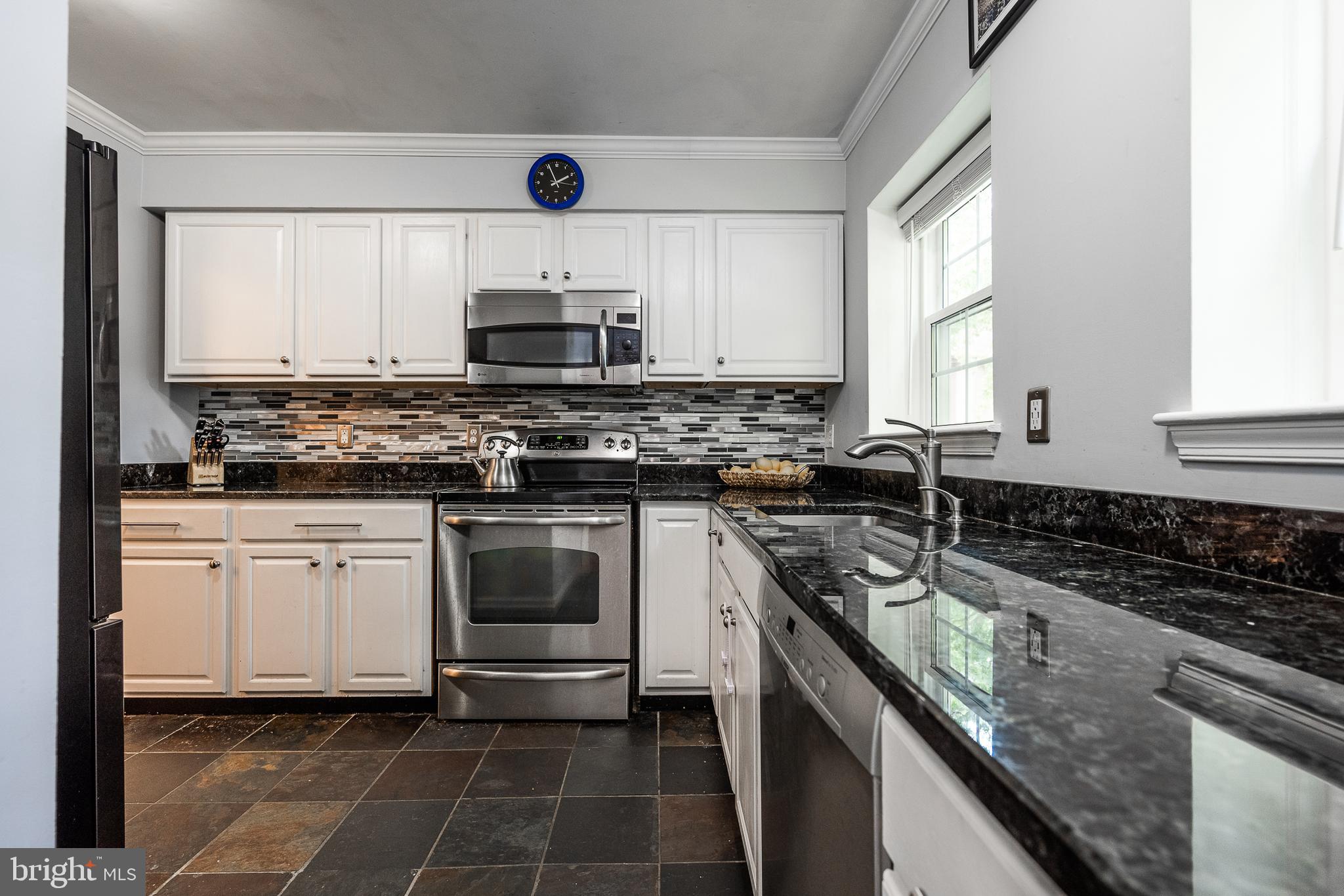 2148 Golf Course Drive Reston, VA 20191 - Photo 2 of 31 Kitchen with Granite Counters