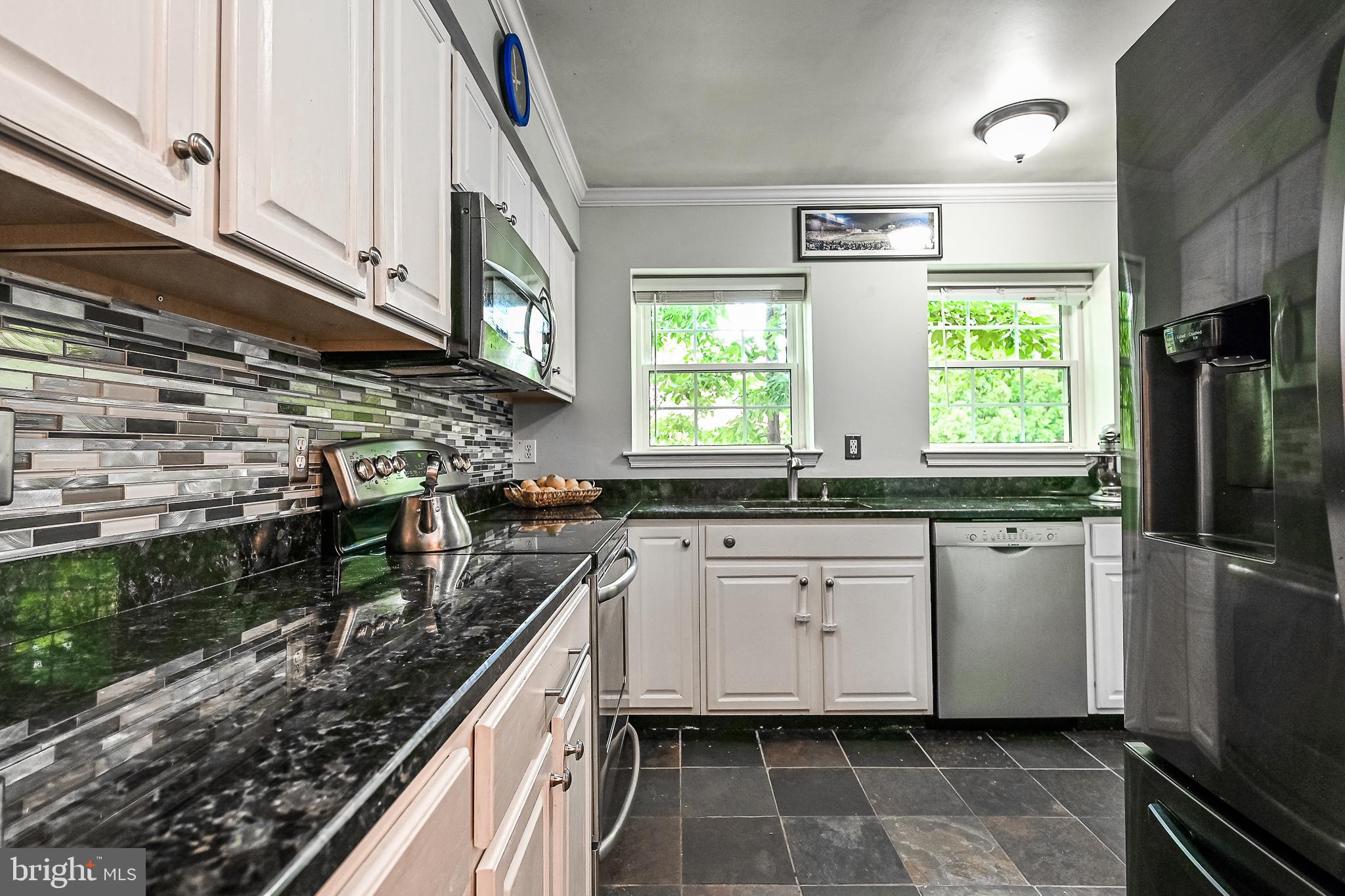2148 Golf Course Drive Reston, VA 20191 - Photo 4 of 31 Double Windows Over Look Front Courtyard