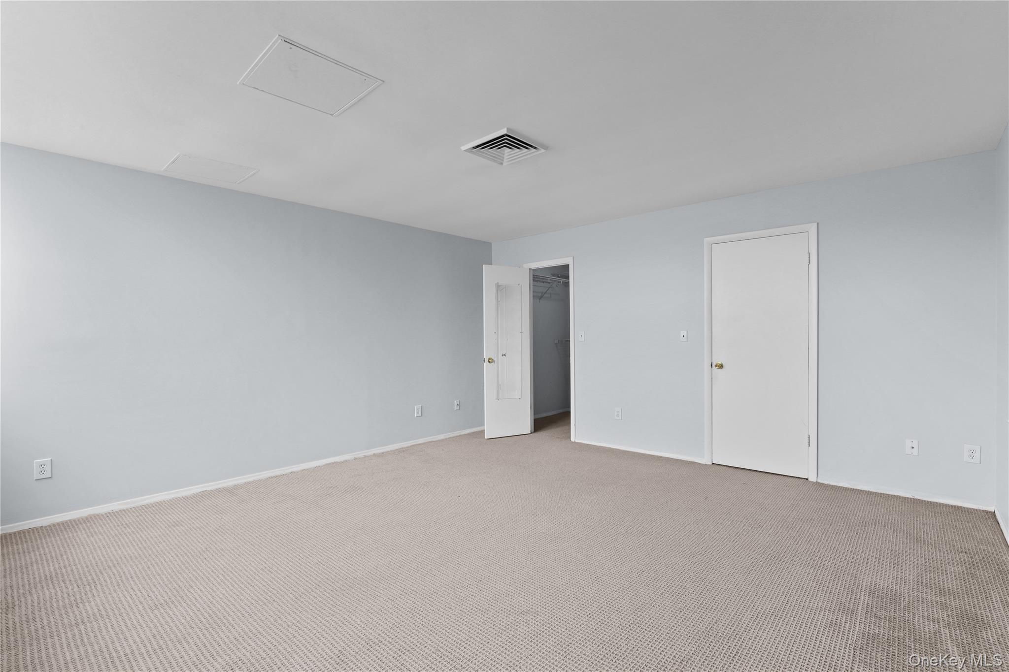 60 Kensico Road, Unit 22 Thornwood, NY 10594 - Photo 9 of 14 a view of an empty room and chandelier fan