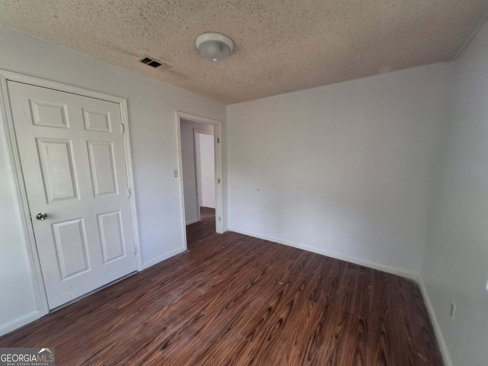 3606 24th Avenue Valley, AL 36854 - Photo 7 of 11 a view of an empty room with wooden floor