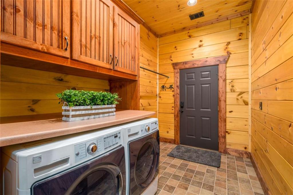 31 High Cliff Road Jasper, GA 30143 - Photo 27 of 50 a utility room with dryer and washer