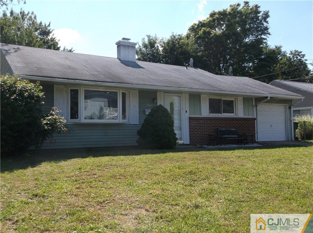 12 Baxter Road Edison, NJ 08817 - Photo 2 of 6 a view of a house with backyard and garden
