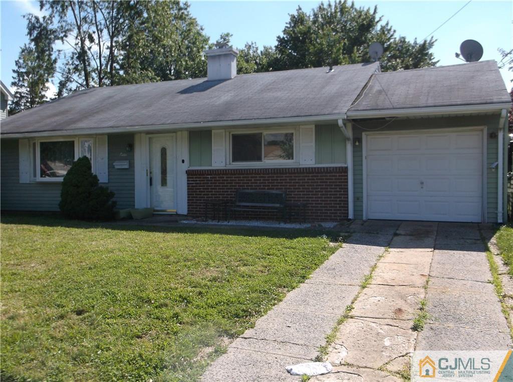 12 Baxter Road Edison, NJ 08817 - Photo 3 of 6 a front view of a house having yard