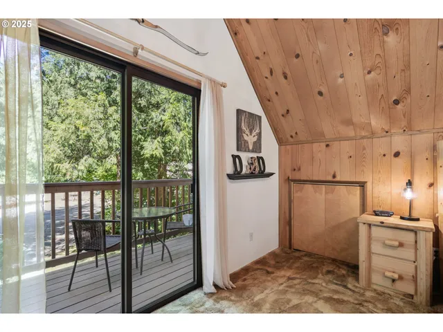 a view of kitchen with furniture and large window