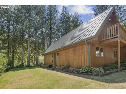 a backyard of a house with lots of green space