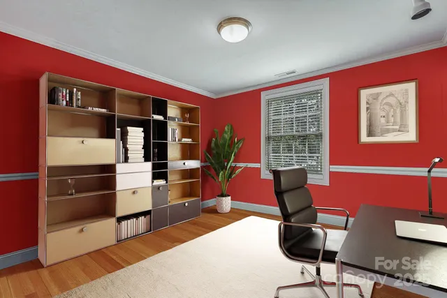 a workspace with furniture and window