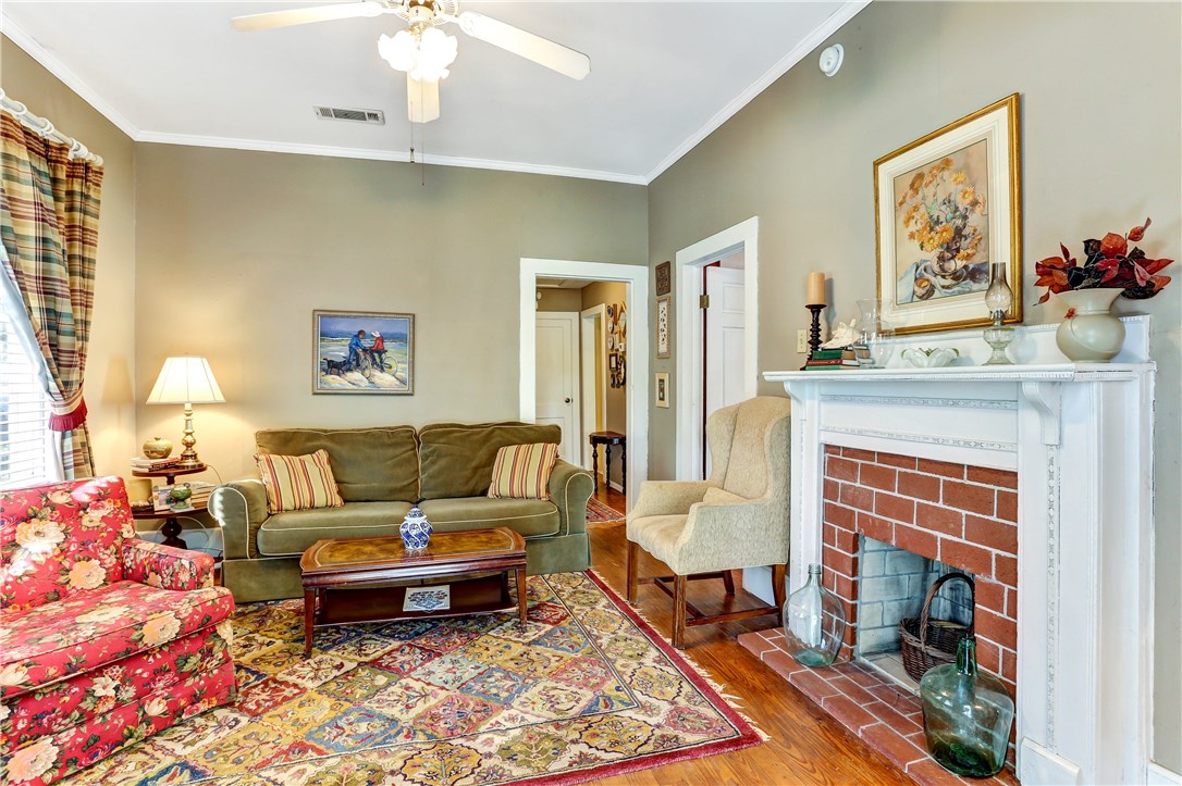 603 Broome Street Fernandina Beach, FL 32034 - Photo 12 of 33 a living room with furniture and a fireplace