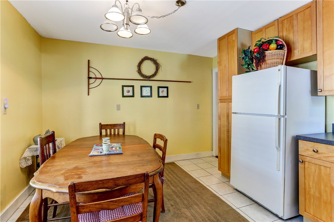 603 Broome Street Fernandina Beach, FL 32034 - Photo 14 of 33 a view of a dining room with furniture and wooden floor