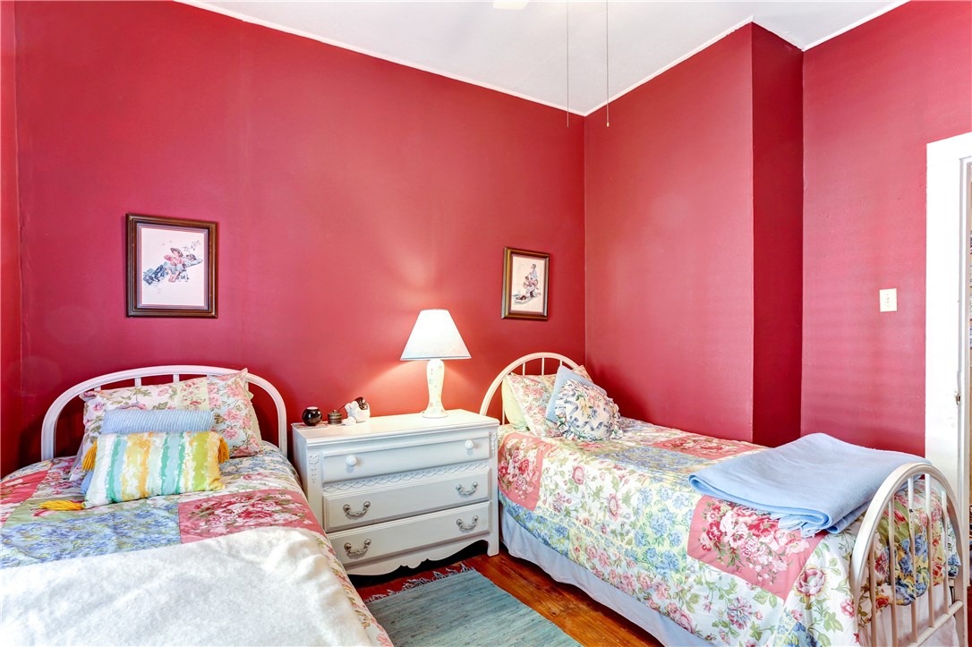 603 Broome Street Fernandina Beach, FL 32034 - Photo 23 of 33 a bedroom with bed and a window