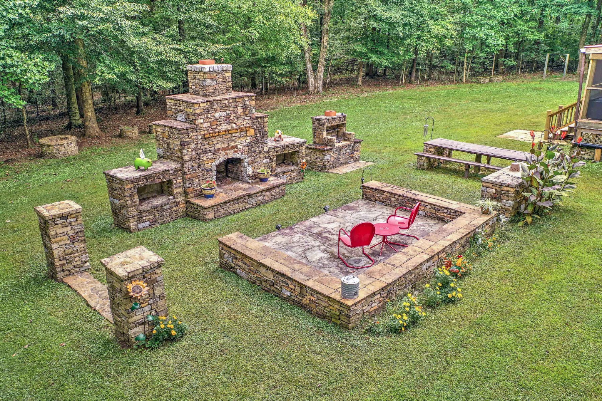 1331 Smith Thompson Road Bethpage, TN 37022 - Photo 5 of 35 a wooden bench sitting in the middle of a park