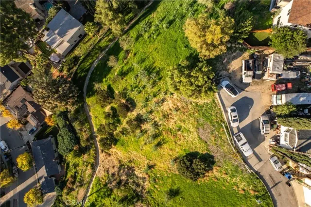 an aerial view of residential building with parking space