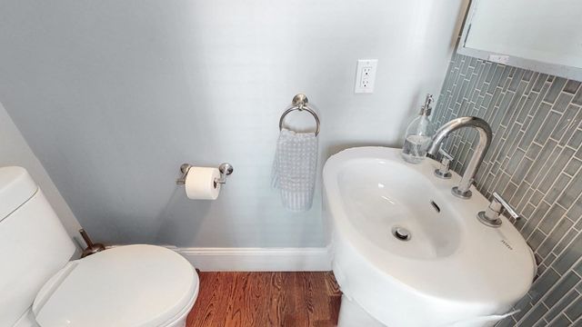 a bathroom with a sink and toilet
