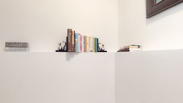 a view of a room with a large window