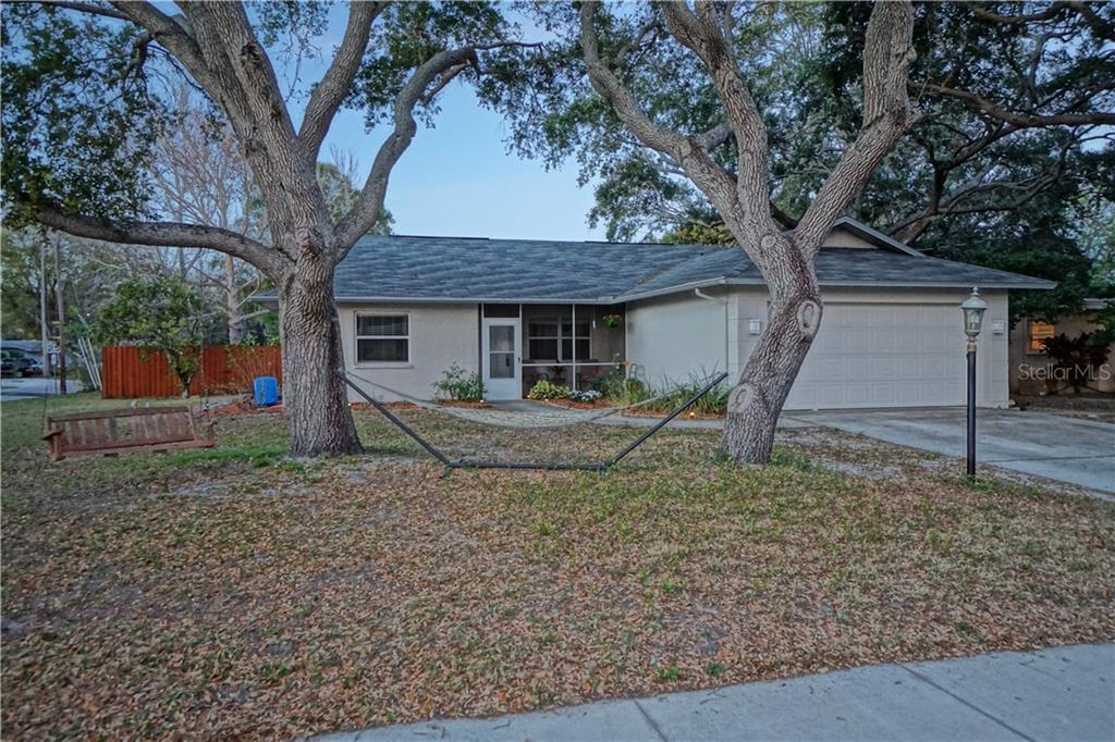 Beautiful Front of Home - Bench & Hammock Convey