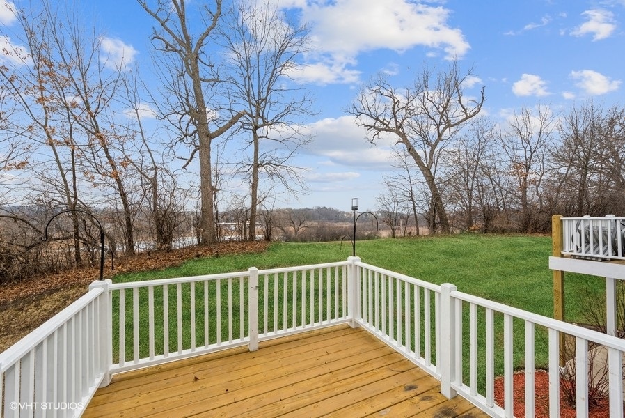 215 Rainier Way Fox Lake, IL 60020 - Photo 13 of 15 a view of a deck with a yard