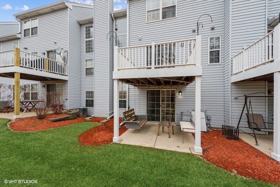 215 Rainier Way Fox Lake, IL 60020 - Photo 15 of 15 a view of a house with backyard porch and sitting area