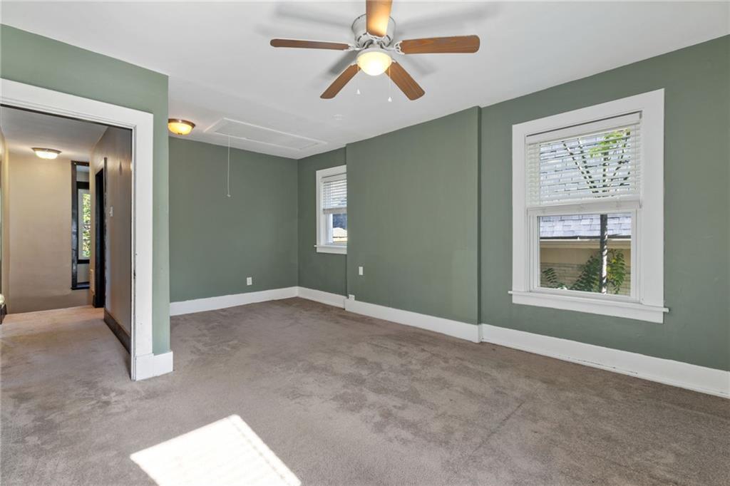 76 Warren Street Pittsburgh, PA 15205 - Photo 19 of 32 an empty room with windows and fan