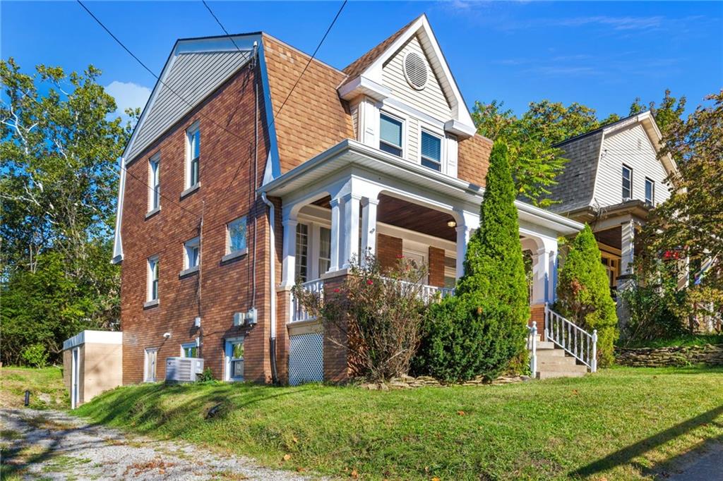 76 Warren Street Pittsburgh, PA 15205 - Photo 2 of 32 a front view of a house with a yard