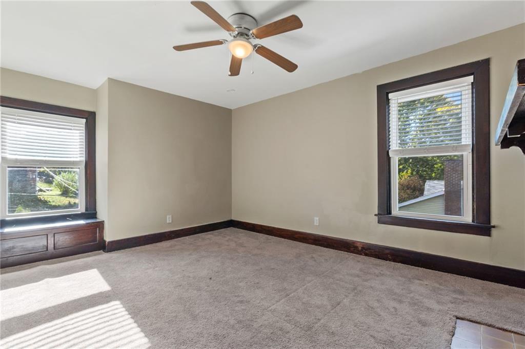 76 Warren Street Pittsburgh, PA 15205 - Photo 21 of 32 an empty room with windows and fan