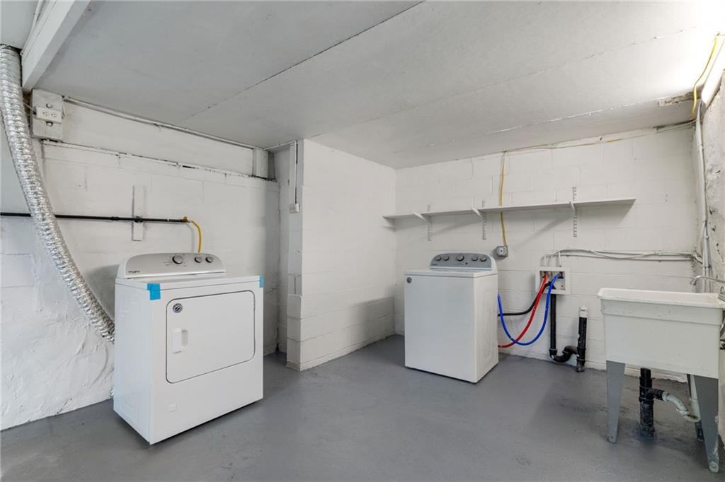 76 Warren Street Pittsburgh, PA 15205 - Photo 26 of 32 a utility room with dryer and washer