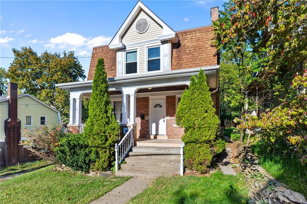 76 Warren Street Pittsburgh, PA 15205 - Photo 3 of 32 a front view of a house with a yard