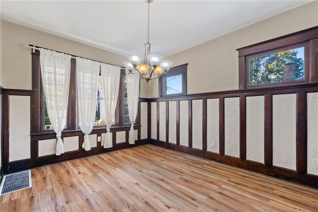 76 Warren Street Pittsburgh, PA 15205 - Photo 8 of 32 a view of a room with wooden floor and furniture