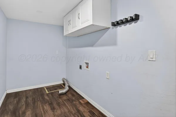 a view of a room with rack on the wall