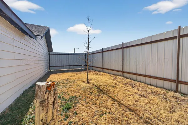 a very nice looking house with a yard