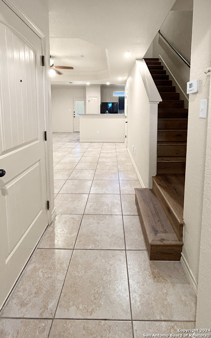 14006 Fratelli Road, Unit 103 San Antonio, TX 78233 - Photo 14 of 16 a view of an empty room and a windows