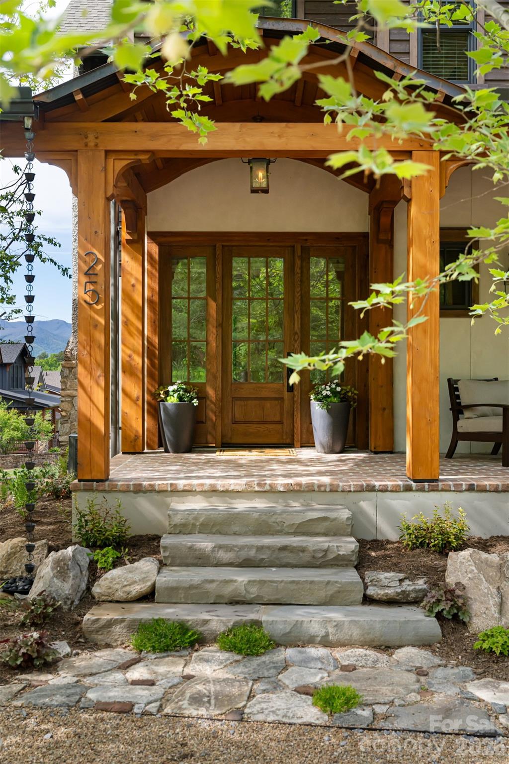 25 Rantis Lane Black Mountain, NC 28711 - Photo 2 of 48 a front view of a house with garden
