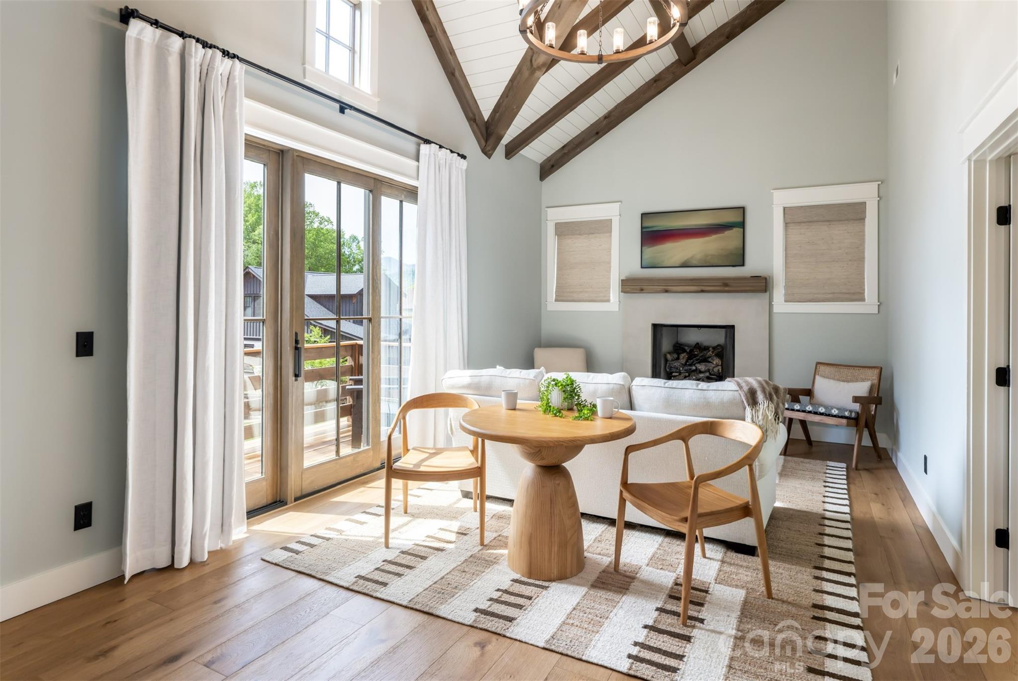 25 Rantis Lane Black Mountain, NC 28711 - Photo 21 of 48 a living room with furniture a fireplace and a table