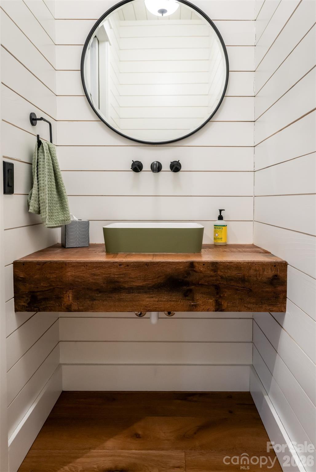 25 Rantis Lane Black Mountain, NC 28711 - Photo 27 of 48 a bathroom with a sink and a mirror