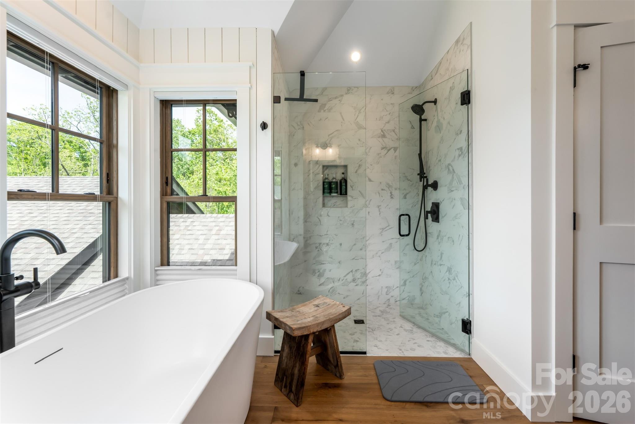 25 Rantis Lane Black Mountain, NC 28711 - Photo 39 of 48 a bathroom with a sink a toilet and shower
