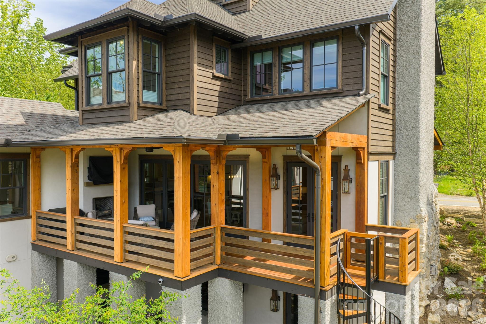 25 Rantis Lane Black Mountain, NC 28711 - Photo 5 of 48 a front view of a house with a balcony