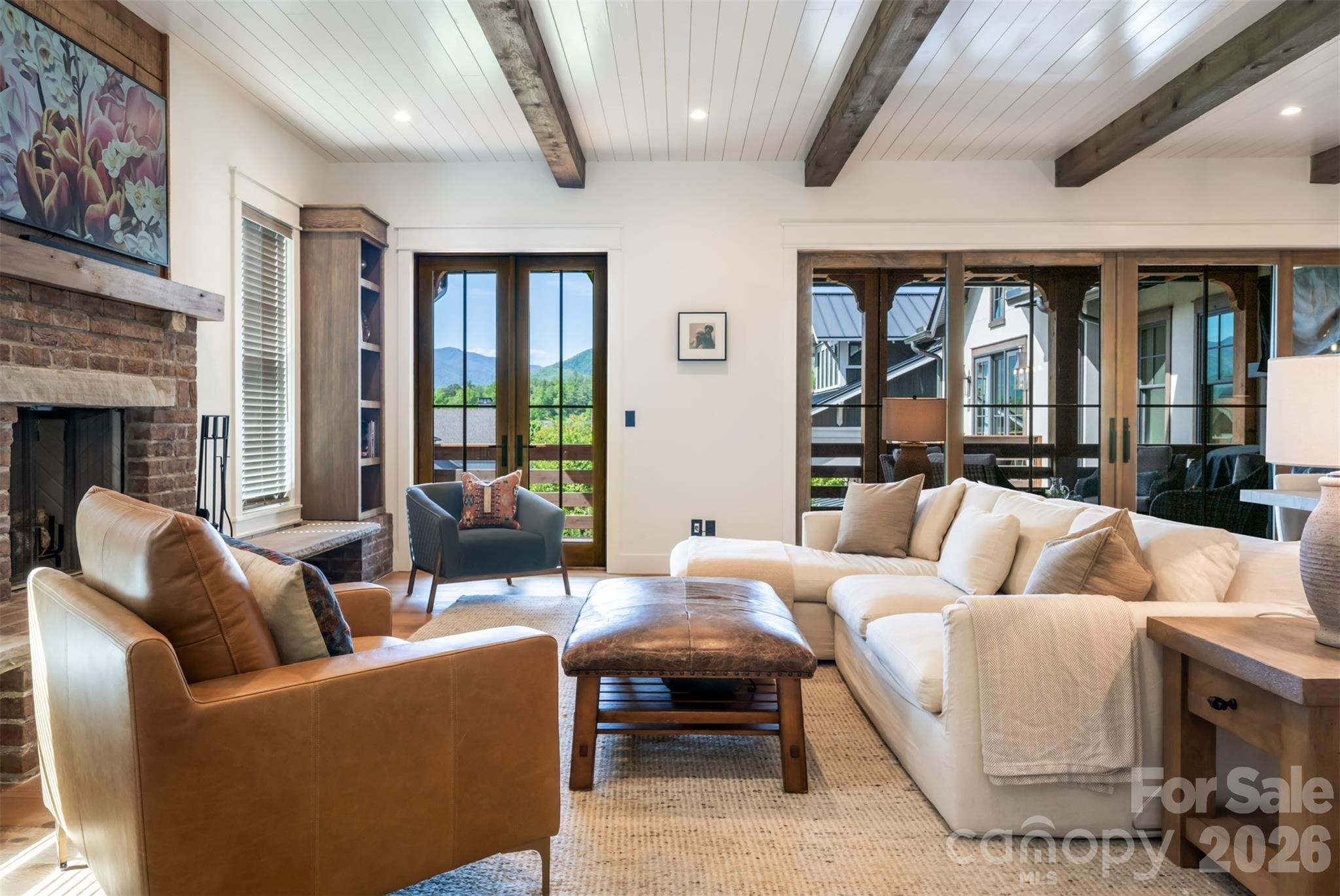 25 Rantis Lane Black Mountain, NC 28711 - Photo 10 of 48 a living room with furniture and a large window