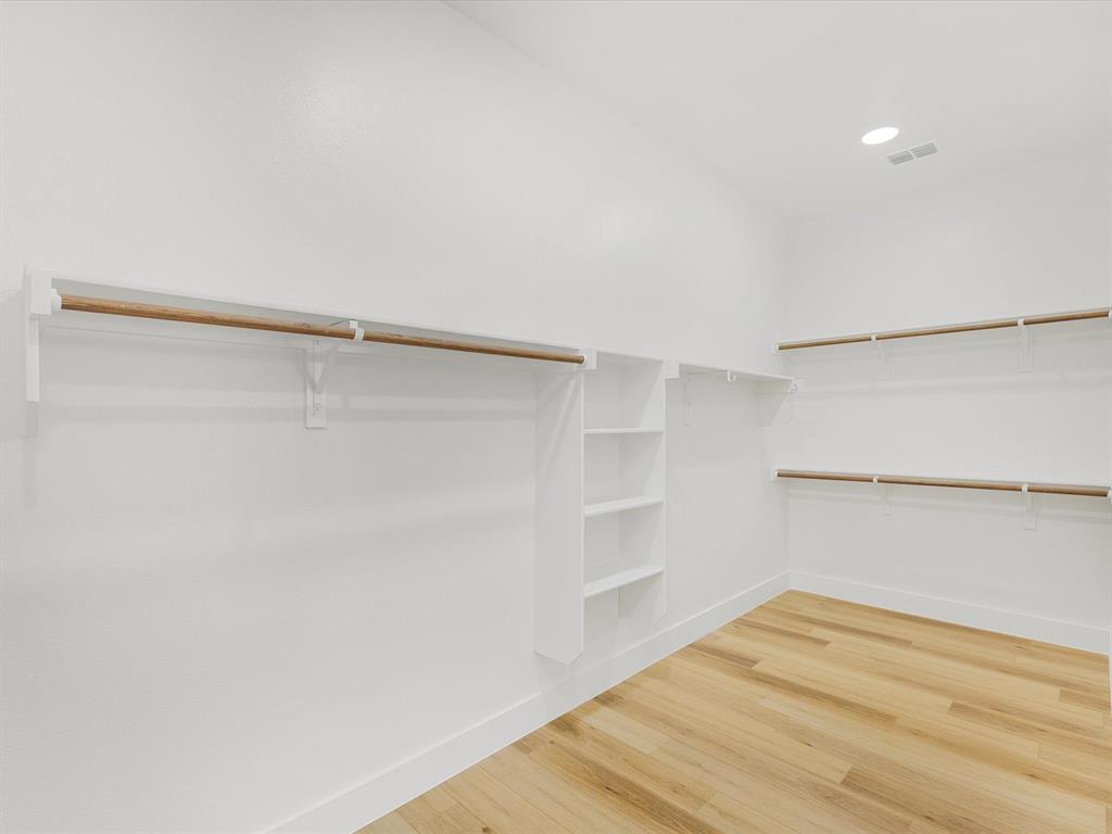 544 Shepherd Road Combine, TX 75159 - Photo 24 of 36 Walk in closet with light wood-type flooring