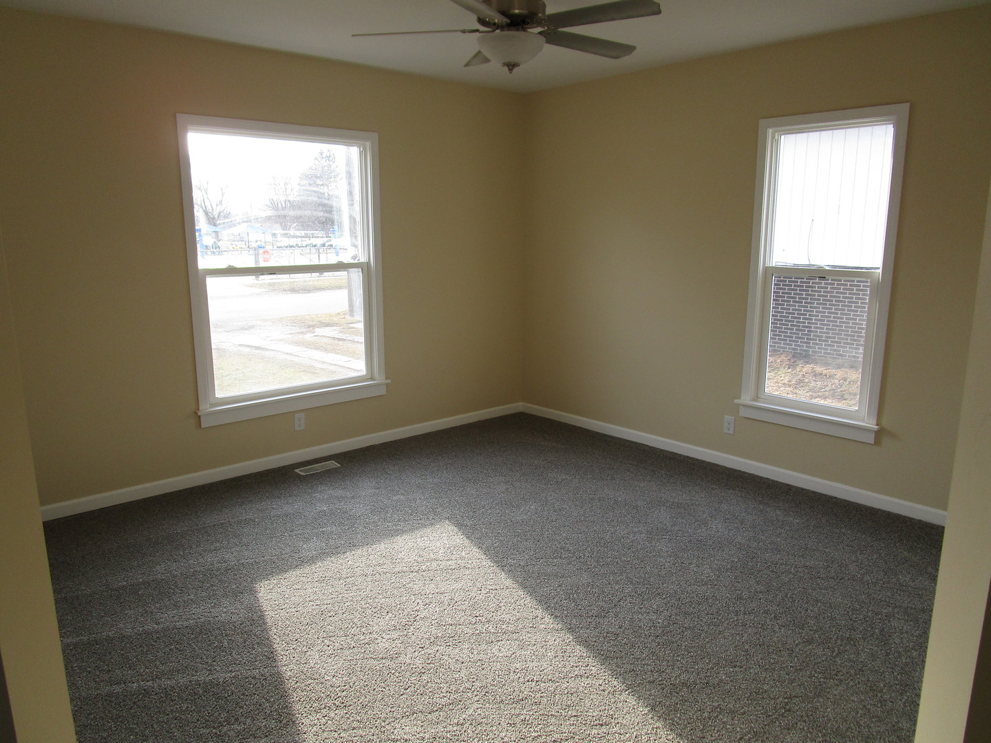 403 West Washington Street Harvard, IL 60033 - Photo 6 of 13 an empty room with a window