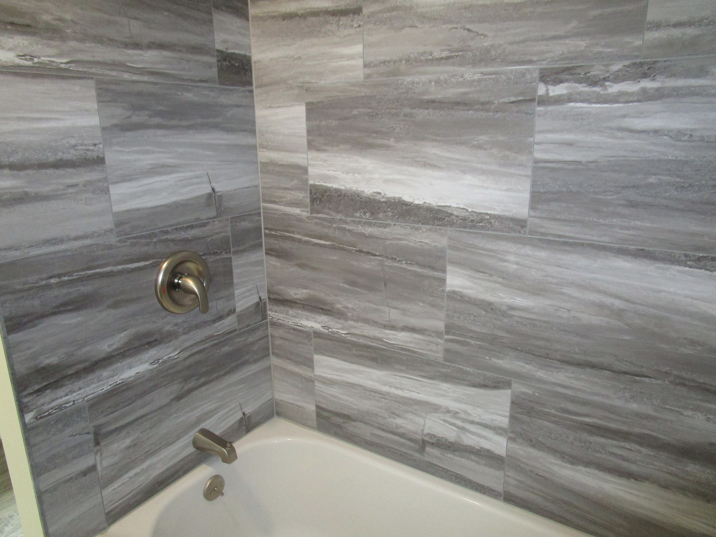 403 West Washington Street Harvard, IL 60033 - Photo 9 of 13 a bathroom with a shower