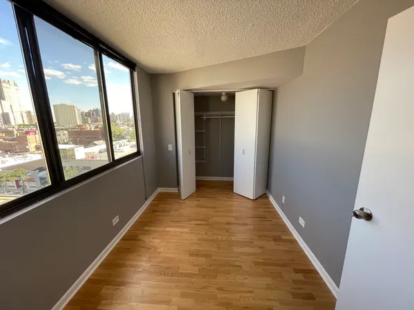a view of hallway with windows
