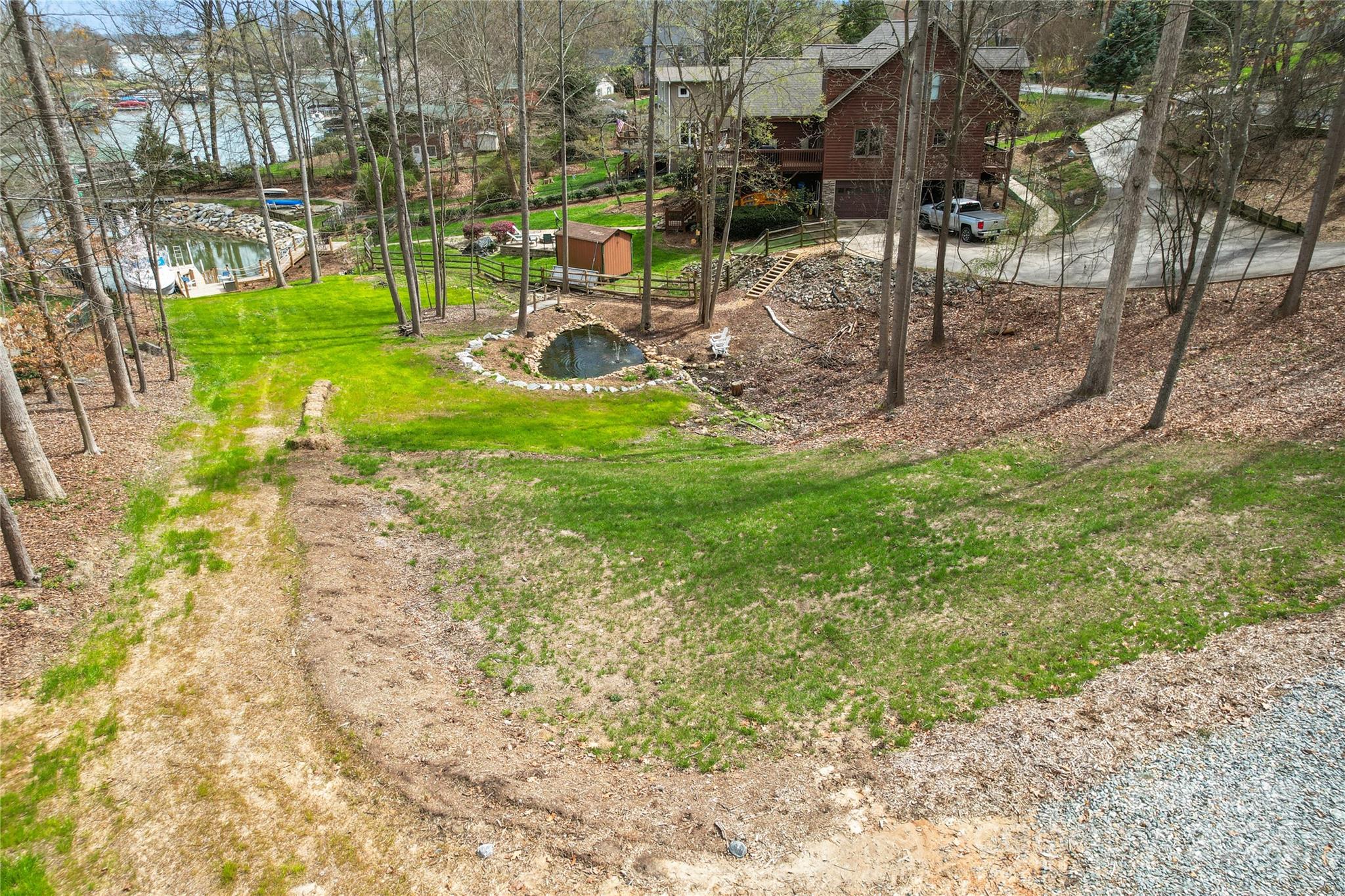 Lot 67 Lake Shore Road South Denver, NC 28037 - Photo 12 of 48 a view of a park with large trees